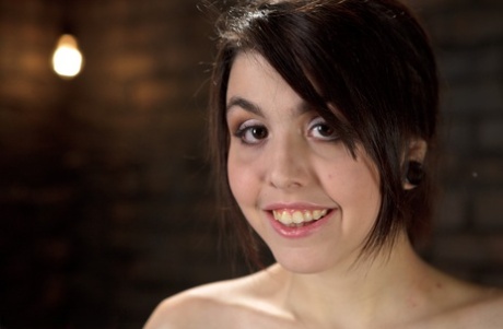 Black haired teen Tegan Tate gets gangbanged by several horny inmates