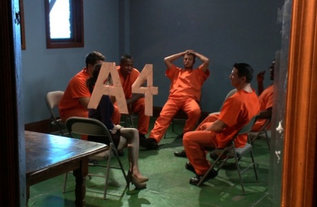 Black haired teen Tegan Tate gets gangbanged by several horny inmates