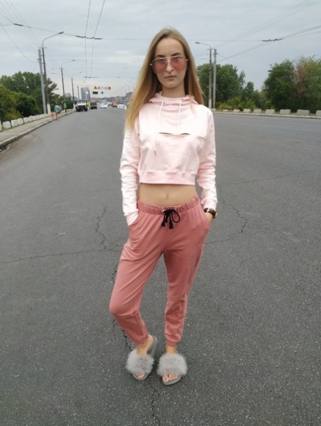 Skinny blonde amateur Katie posing in her sexy sportswear in public
