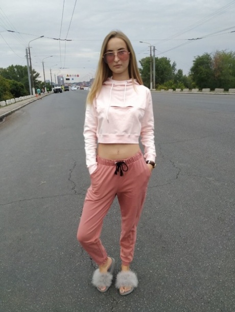 Skinny blonde amateur Katie posing in her sexy sportswear in public