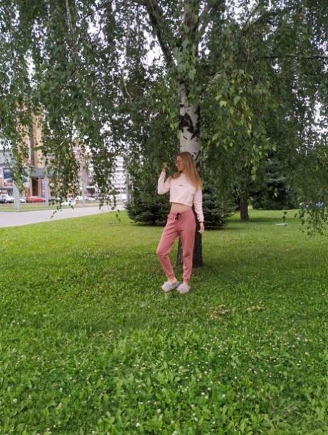 Skinny blonde amateur Katie posing in her sexy sportswear in public