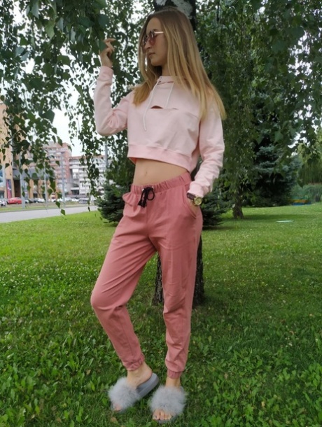 Skinny blonde amateur Katie posing in her sexy sportswear in public