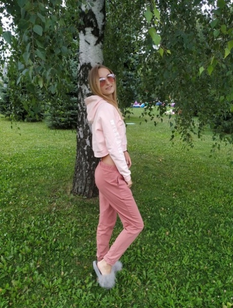 Skinny blonde amateur Katie posing in her sexy sportswear in public