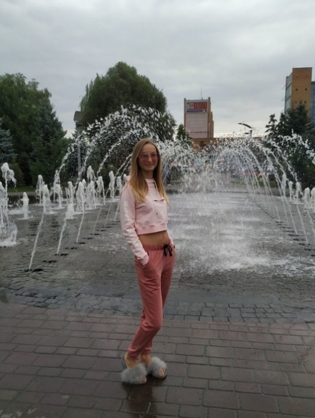 Skinny blonde amateur Katie posing in her sexy sportswear in public
