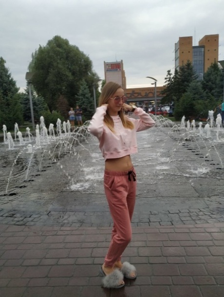 Skinny blonde amateur Katie posing in her sexy sportswear in public
