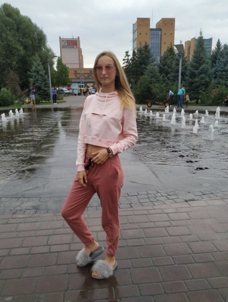 Skinny blonde amateur Katie posing in her sexy sportswear in public