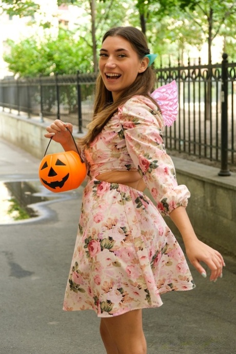 Playful teens getting involved in a kinky Halloween lesbian orgy