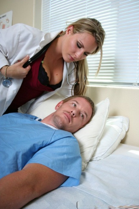 Blonde nurse Harmony Rose gives her patient a blowjob before riding his dick