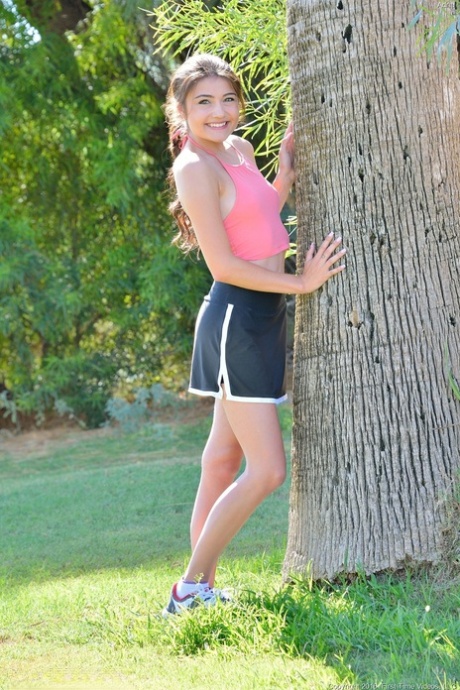 Cute amateur babe Adria poses nude at the golf course & masturbates in public